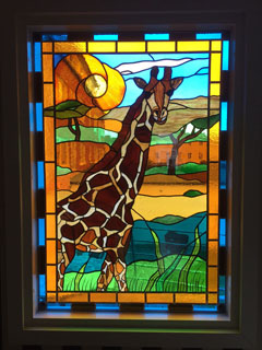 Giraff på savann